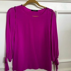 Vibrant Tahari pink silk top with peekaboo detail